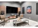 Home theater featuring a large TV screen, speakers, comfortable seating, carpeted floors, and modern decor at 19887 Kershaw Ct, Monument, CO 80132