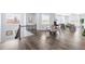 Open loft area overlooking the living area, featuring hardwood floors and natural light at 19887 Kershaw Ct, Monument, CO 80132