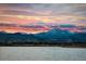 A picturesque view of mountains at sunset at 3142 Captains Ln, Longmont, CO 80503