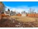 Large backyard with shed and wooden fence at 2602 S Lafayette St, Denver, CO 80210