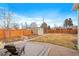 Backyard with patio, shed, and wood fence at 2602 S Lafayette St, Denver, CO 80210