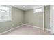 Finished basement room with neutral walls and carpet at 2602 S Lafayette St, Denver, CO 80210
