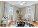 Versatile room used as an office, featuring a desk and hardwood floors at 2602 S Lafayette St, Denver, CO 80210