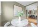 Cozy breakfast nook with marble table and white chairs at 2602 S Lafayette St, Denver, CO 80210