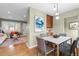 Open concept dining area adjacent to living room and kitchen at 2602 S Lafayette St, Denver, CO 80210