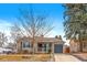Charming ranch home with landscaped yard and attached garage at 2602 S Lafayette St, Denver, CO 80210
