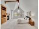 Main bedroom features vaulted ceilings, wood beams, a fireplace, and window shutters at 1075 E Oxford Ln, Cherry Hills Village, CO 80113