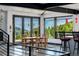 Bright dining area with stunning mountain views and modern pendant lighting at 5896 Peregrine Trl, Golden, CO 80403