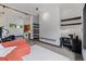 A modern laundry room featuring a laundry area and office setup with contemporary design and minimalist decor at 5896 Peregrine Trl, Golden, CO 80403