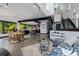 Open floorplan features dining, living and kitchen areas, offering a great flow for entertaining at 5896 Peregrine Trl, Golden, CO 80403