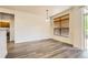 Bright dining area with wood floors and large window overlooking the outside at 19259 E Caspian Pl, Aurora, CO 80013