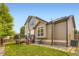 Exterior view of the home showcasing siding, windows, and an outdoor deck at 19259 E Caspian Pl, Aurora, CO 80013