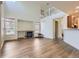 Bright, open living room featuring a fireplace and a view of the loft at 19259 E Caspian Pl, Aurora, CO 80013