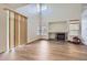 Bright, open living room featuring a fireplace and large windows at 19259 E Caspian Pl, Aurora, CO 80013