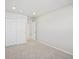 Simple bedroom with double door closet and carpet at 8869 Sedalia St, Commerce City, CO 80022