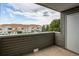 Balcony with view of complex and a door leading to the outside at 908 S Yampa St # 208, Aurora, CO 80017