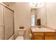 Cozy bathroom with shower, toilet, vanity, mirror, and soft lighting at 908 S Yampa St # 208, Aurora, CO 80017