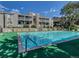 Inviting community pool with pristine water, surrounded by well-maintained grounds and residential buildings at 908 S Yampa St # 208, Aurora, CO 80017