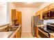 Kitchen featuring stainless appliances and spacious countertops at 908 S Yampa St # 208, Aurora, CO 80017