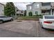 Convenient parking area near a well-maintained building with visible unit numbers at 908 S Yampa St # 208, Aurora, CO 80017