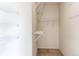 Walk-in closet with metal shelving at 908 S Yampa St # 208, Aurora, CO 80017