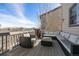 Back deck with outdoor seating and views at 12532 Daniels Gate Dr, Castle Pines, CO 80108