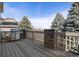 Back deck with stone features at 12532 Daniels Gate Dr, Castle Pines, CO 80108