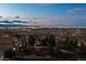 Stunning city skyline view at night from a beautiful property, showcasing the vibrant cityscape at 12532 Daniels Gate Dr, Castle Pines, CO 80108