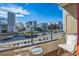 Balcony with outdoor seating overlooking city street and new construction neighborhood at 1216 Perry St, Denver, CO 80204