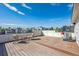 Rooftop deck with city views and seating area at 1216 Perry St, Denver, CO 80204