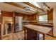 Well-lit kitchen features stainless steel appliances, wood cabinets, and a central island with a butcher block countertop for meal prep at 3722 Monterey Pl, Boulder, CO 80301