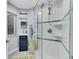 Bathroom featuring glass shower, subway tile, and updated fixtures at 4702 S Biscay Ct, Aurora, CO 80015