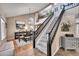 Open entryway with stairs and adjacent dining room at 4702 S Biscay Ct, Aurora, CO 80015