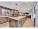 Spacious kitchen with a large island and stainless steel appliances at 4702 S Biscay Ct, Aurora, CO 80015