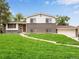 Charming brick home featuring a well-manicured lawn and inviting curb appeal at 13561 W Alaska Pl, Lakewood, CO 80228
