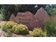 Community entrance sign reading 'Green Mountain Estates' surrounded by landscaping at 13561 W Alaska Pl, Lakewood, CO 80228
