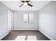 Simple bedroom with a ceiling fan and natural light at 1930 Grove St # 2, Denver, CO 80204