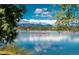 Kayakers on a calm lake with mountain views at 1930 Grove St # 2, Denver, CO 80204