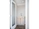 Convenient laundry area with washer, dryer, and additional storage at 1930 Grove St # 2, Denver, CO 80204