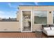 The rooftop patio boasts outdoor seating, along with a convenient kitchenette for entertaining at 1930 Grove St # 2, Denver, CO 80204