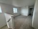 Cozy loft area perfect for a home office or relaxation space with neutral carpet at 2142 S Irvington St, Aurora, CO 80018
