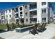 Relaxing outdoor space with firepit and comfortable seating at 6153 N Ceylon St # 306, Denver, CO 80249