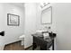 Bathroom featuring a modern vanity, vessel sink, decorative mirror, and contemporary toilet at 960 N Pennsylvania St # 6, Denver, CO 80203