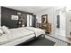 Stylish bedroom featuring a neutral palette, hardwood floors, modern accents, and closet at 960 N Pennsylvania St # 6, Denver, CO 80203