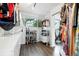 Bright walk-in closet with organized shelving, hanging rods, and natural light from a window at 960 N Pennsylvania St # 6, Denver, CO 80203