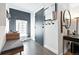 Modern entryway with a decorative accent wall and stylish furnishings at 960 N Pennsylvania St # 6, Denver, CO 80203