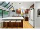 Contemporary kitchen featuring stainless steel appliances, gas range, white countertop and a spacious kitchen island at 960 N Pennsylvania St # 6, Denver, CO 80203
