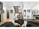 Spacious living room featuring a staircase and contemporary design elements at 960 N Pennsylvania St # 6, Denver, CO 80203