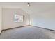 Bright bedroom featuring neutral walls, a ceiling fan and light gray carpet at 11580 Depew Ct, Westminster, CO 80020