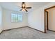 Cozy bedroom featuring a ceiling fan, neutral walls, and a window at 11580 Depew Ct, Westminster, CO 80020